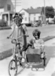 Mary on bike with Dick Klein